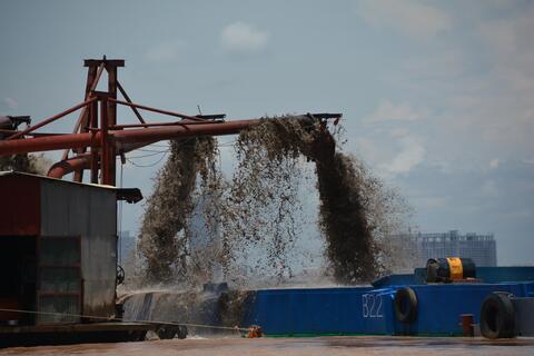 Sand mining by suction dredging, Mekong River, near Phnom Penh